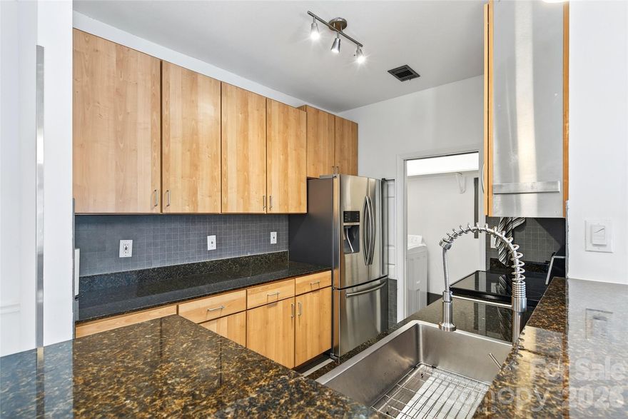 If you have been looking for a sunny and well maintained, maintenance free Condo, in a prime location, look no further! This 2 bedroom 2 bathroom Condo was completely updated in 2019 with beautiful Italian tile floors throughout, Smart fixtures including lights, fans, and window blinds, as well as, stainless steel appliances, bathroom fixtures, and farm sink. Both bedrooms have walk-in closets and direct access to a full bathroom. One bedroom  is an en suite and one bedroom has access to the bathroom through the large walk-in closet. The condo complex is on a quiet dead end road surrounded by forest with community green space to enjoy an evening fire or cookout. Enjoy your morning coffee or evening tea on the south facing balcony with mountain views. Less than 10 min. to downtown Asheville, Blue Ridge Parkway and just steps away from Restaurants.