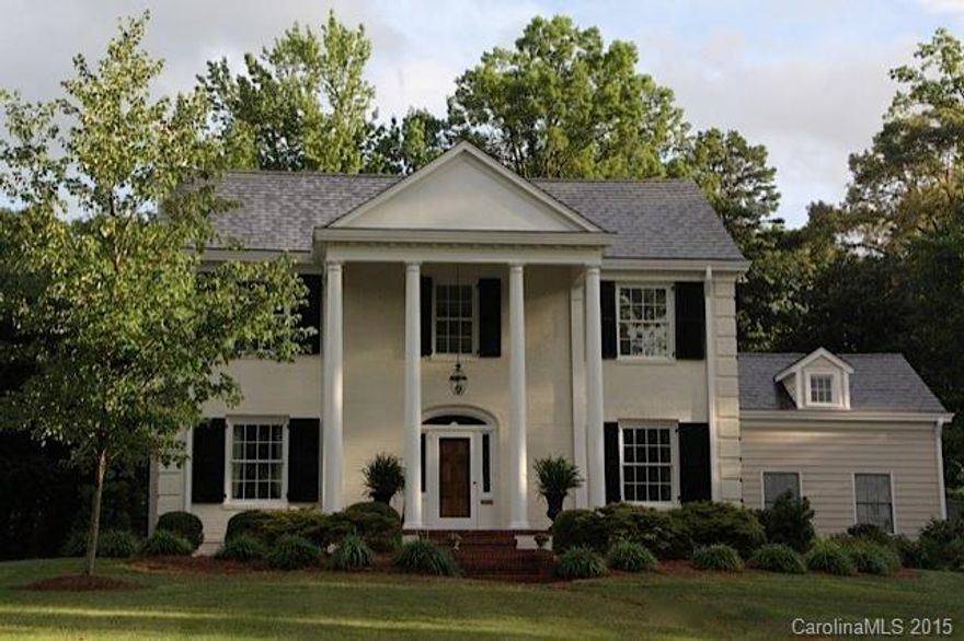 NEW LOOK-NEW PRICE..EXTERIOR BRICK PAINTED Lovely lot on desirable street. Slate roof, high ceilings, wonderful flow, generous rm sizes & good natural light. Additions include spacious great rm, 2nd floor master suite, covered porch, play rm & utility rm. Granite kitchen open to great room. Updated baths. 3 fireplace (2 inside) Walk-in attic & unfin space above carport ('02)offer an additional 725+/ft of excellent expansion possibilities. This is a great home !Renovated & Expanded in 2000.