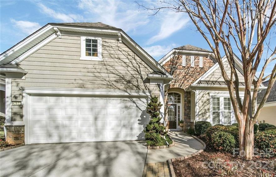 Move-in ready Willow Bend w/sunroom in sought-after Sun City Carolina Lakes! Gleaming hardwood floors flow throughout the main living areas. Eat-in kitchen boasts a breakfast nook, computer niche, island w/storage, granite countertops, tile backsplash & stainless-steel appliances. A breakfast bar separates the kitchen from the dining area. Open living room w/gas log fireplace flows into light-filled sunroom w/views of the backyard. Spacious primary suite features a tray ceiling & ensuite bath w/soaking tub, glass enclosed shower, dual sink vanity, & walk-in closet. Guest bedroom sits at the front of the home w/access to a full hall bath. Double glass doors open to a home office, perfect for a hobby room. Enjoy sitting outside on stamped concrete patio w/retractable awning & custom landscaping for additional privacy. Epoxy floor in the garage with built-in storage racks. *Detailed list of updates/upgrades in Attachments* Amenity rich community conveniently located to dining & shopping.