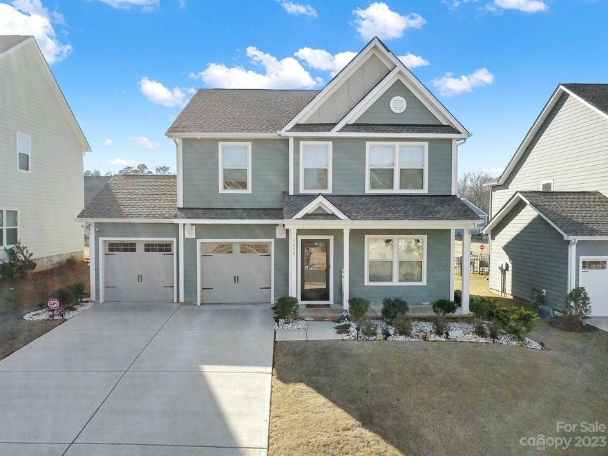 Beautiful Inverness model now available in The Manors at Handsmill! Built in 2020, this 3 BR, 2.5 BA home w/loft AND a flex room is like new. Meticulously maintained, this open floor plan is a must see. Enjoy a spacious kitchen island w/granite, bar seating, SS appliances, modern & light kitchen cabinets, tile backsplash & decorative pendant lights. A flex space off the kitchen is ideal for a home office, hobby, or sunroom. Convenient custom drop zone w/storage space awaits as you enter home f/garage. The upper level features the Primary Suite w/ensuite bath featuring dual sink vanity, walk-in shower & generous walk-in closet. Great loft space & two sizeable guest bedrooms w/access to a full hall bath finish out the upstairs. Relax & enjoy the covered patio w/ceiling fans & fenced in backyard. Community amenities include outdoor pool, clubhouse, playground & access to Lake Wylie. Don't forget the local shopping, dining, & entertainment. This home is MOVE-IN ready & waiting for YOU!