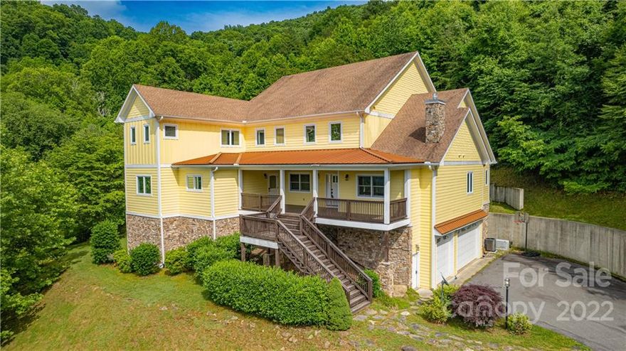 Beautiful 6300+/- sq. ft. home which boasts of an open floor plan and a gorgeous kitchen with granite countertops and propane fireplace in the den and a second propane fireplace in the office. 2 Stories on basement with 3 car garage, 79+/- acres with magnificent year-round long-range views. Own your very own mountain with loads of hardwoods, fruit trees, trails, and additional building sites. Great spot for a family compound or Air BNB! Also includes a dog kennel, 2100 sq ft doublewide, storage shed, and pond. 4-zoned HVAC. No value is given to the doublewide.