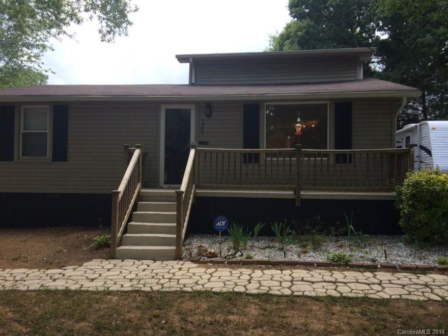 Nice 3 bed/2 bath home.  Laminate floors, new roof, kitchen island and refrigerator(2012) convey.
Woodstove in great room (2012) Driveway on each side of the house.