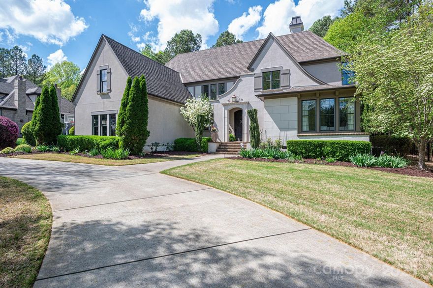 How do you know what makes a house a HOME?  When you step foot through the front door and can feel its heartbeat! A HOME has walls steeped in love, accomplishments, and memories... It has gardens where the Lenten Roses, Cherry Blossoms, and Snowball Hydrangeas have been meticulously groomed and lovingly maintained... A Happy Home is where every hand and footprint, brick, and door is cherished. THIS HOME is where a family has lovingly created a sacred space to pass along to its next stewards! DESIGNED to CHERISH and to WELCOME ALL WHO ENTER... YOU'LL LOVE the lower AND an upper level primary suites, a kitchen designed to linger and laugh after the last bite, an expansive REC ROOM with a wet bar, indoor basketball hoop, dartboard, media connections, and a full bathroom... a night-lit putting range, paver patio w/ wood-burning fireplace, an expansive screened porch, an office on the main level, AND an upper level bonus room (potential 5th BR) with a full closet (wrapping room)!