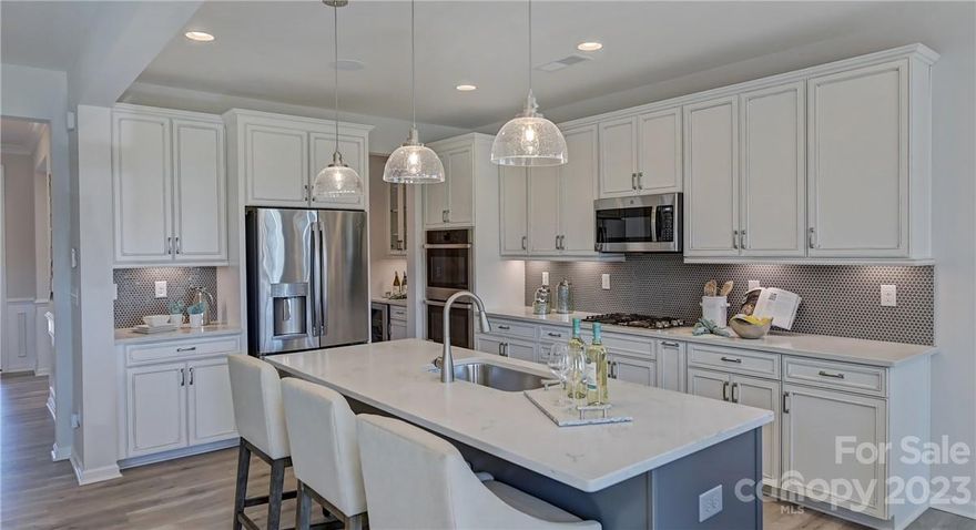 MLS # 4061909 REPRESENTATIVE PHOTOS ADDED. Spring Completion! The Waverly floor plan features an open-concept first floor with a large gathering room and kitchen, complete with a large walk-in pantry, butler’s pantry, and luxurious food prep island. The spacious plan includes a first-floor guest suite at the rear of the home. An extraordinary owner’s retreat stretches out across the rear of the second floor. Decompress after a long day in a lavish owner’s suite with dual sinks, shower and soaking tub, and two walk-in closets! The second level features 3 additional bedrooms, two full baths, including an en suite and Jack and Jill, a laundry room, and a spacious loft. Additionally, this home features a finished walkout basement with another guest suite! Structural options include: tray ceiling, 1st floor guest suite w/ shower, covered outdoor living, additional windows, fireplace, finished walkout basement w/ bed, rough in plumbing for future wet bar, gourmet kitchen & butler's pantry.