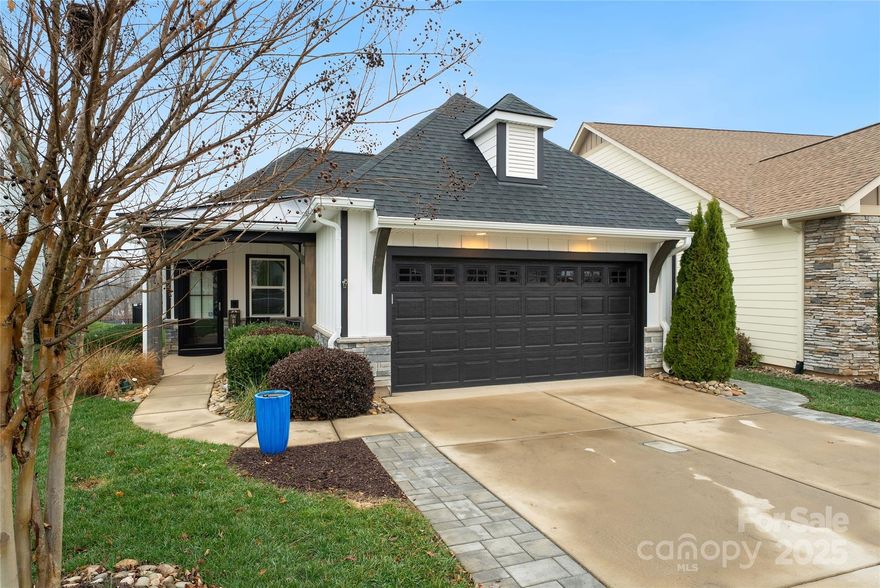 Located in the Trilogy Lake Norman 55+ community, this Shea Homes Independence floor plan offers an open design centered around the main living area and extended all season sunroom, creating multiple gathering spaces rather than several enclosed flex rooms.

The light-filled interior features durable luxury vinyl flooring throughout the main living areas, a custom fireplace focal point, and a spacious kitchen with upgraded cabinetry, granite countertops, oversized island, gas range, and pantry. The adjoining heated and cooled sunroom functions as a year-round living extension ideal for relaxing, hobbies, or entertaining.

The primary suite includes dual vanities, a tiled walk-in shower with bench, and custom California Closet organization. A secondary bedroom and full bath provide comfortable guest accommodations while maintaining an efficient, easy-to-maintain footprint.

The elevated homesite offers privacy with fencing and hardscape pavers, providing usable outdoor space without extensive upkeep. Trilogy residents enjoy resort-style amenities including indoor and outdoor pools, fitness center, pickleball and tennis courts, walking trails, dog park, restaurant, and social clubs.