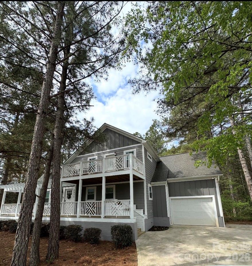 Welcome home to Stockbridge Estates.  This thoughtfully designed 3 Bedroom floorpan ,maximizes space and light with a beautiful vaulted Greatroom and luxury vinyl flooring throughout.  You can enjoy versatile living with two primary bedrooms (one up and one down).  The upstairs suite is a true getaway with a huge walk-in closet and ensuite.  The kitchen features a separate pantry and a beautiful wet bar/coffee station.  The home has a massive wrap-around deck, fire pit area, and balcony of three distinct ways to enjoy the fresh air. Easy hops to Charlotte, Belmont, Denver, shopping, dining, and the Whitewater rafting center.