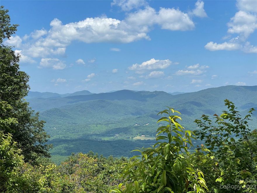 This lot is one of the highest lots in the former Queens Gap development which is now called Great Sky. It is a gated community with paved roads and public water. This lot has INCREDIBLE western mountains view and in some spots depending on foliage across the road would have views to the east stretching as far as the eye can see. No severe restrictions with new POA and dues are currently only $600 annually. Electricity is currently not up to this level. REMC Electrical would work with a buyer who has an approved home plan to bring power up to this level at a shared cost formula.