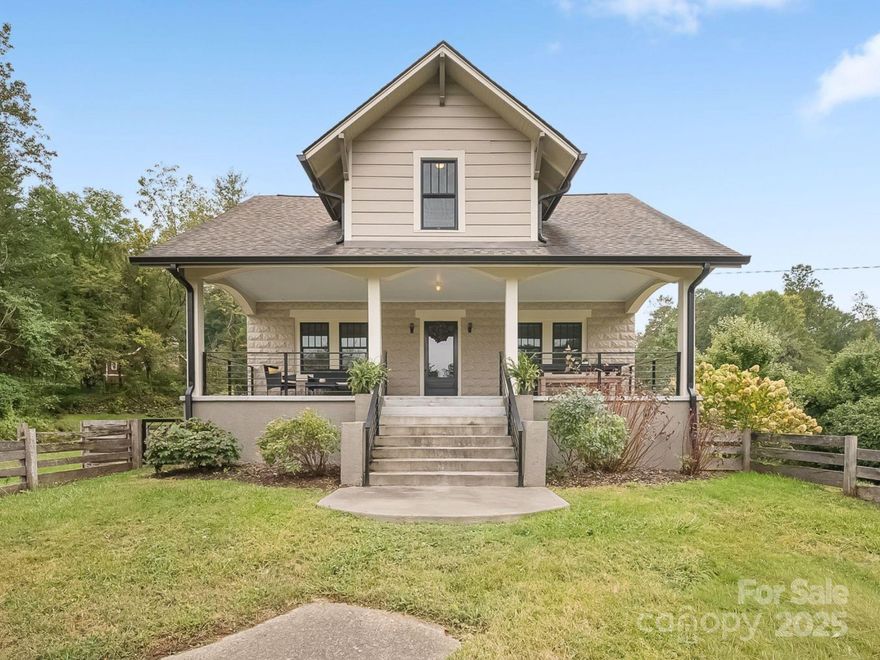 Historic charm, modern luxury—your Asheville dream farmhouse awaits. Minutes from downtown Asheville, this 7.5 acre estate is a rare sanctuary. The meticulously restored farmhouse showcases timeless craftsmanship with its original hardwood floors and wood burning stove, with modern updates including solar power. A detached guest cottage offers chic accommodations for visitors, or potential rental income. A retreat from the everyday grind with pastural rolling acres, tranquil streams, garden beds, a fenced-in yard, and even a chicken coop. Perfect for those dreaming of a mini farm with animals, homesteading, or just looking for serenity. Entertain with family or friends or simply relax and enjoy the abundant wildlife on the front and back covered porches. The updated kitchen seamlessly flows into the dining space and inviting living room. An expansive primary suite features a generous walk-in closet and private bonus room. Here, elegance, sustainability, and boundless potential converge.