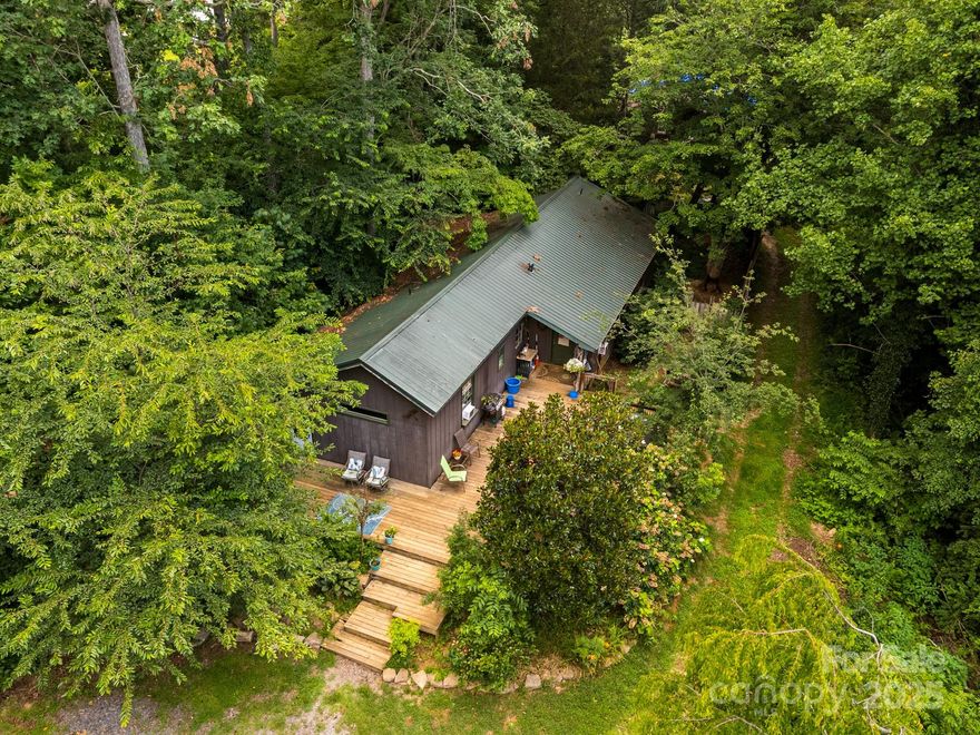 HIGHEST & BEST OFFERS DUE MONDAY, 7/21. Two Homes for the Price of One! This versatile 1.89-acre oasis in beautiful Fairview offers the perfect blend of privacy, functionality, and opportunity. Nestled on an easily accessible lot, the property includes two distinct residences with endless potential—live in one and rent out the other, host guests, or create a multi-generational homestead. 17 McGee Hill is a charming site-built home featuring vaulted ceilings, granite countertops, and a warm, welcoming layout filled with natural light. 19 McGee Hill may be classified as a singlewide, but you'd never know it. Thoughtfully renovated and expanded, this 2-bedroom, 2-bathroom home includes an inviting covered back porch and outbuilding—perfect for storage, a workshop, or creative space. Whether you're looking for a smart investment, a peaceful retreat, or room to grow, this property delivers. The possibilities are endless—come see for yourself!