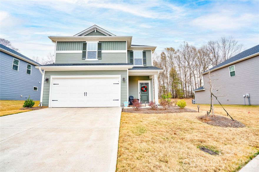 Built in 2025 by Meritage Homes, this move-in ready 3-bed, 2.5-bath home sits near the end of a cul-de-sac and overlooks a peaceful pond, one of the best locations in the community. The home features an open main level, a bright kitchen, and a level yard on a flat lot. All appliances convey, including the refrigerator, washer, dryer, and window blinds. Enjoy the convenience of a two-car garage, modern energy-efficient construction, and a low-maintenance lifestyle. Located just minutes from Shelby and Boiling Springs, with easy access to Charlotte (about 1 hour) and Asheville (about 1 hour 22 minutes). A great opportunity to own a nearly new home without the wait.