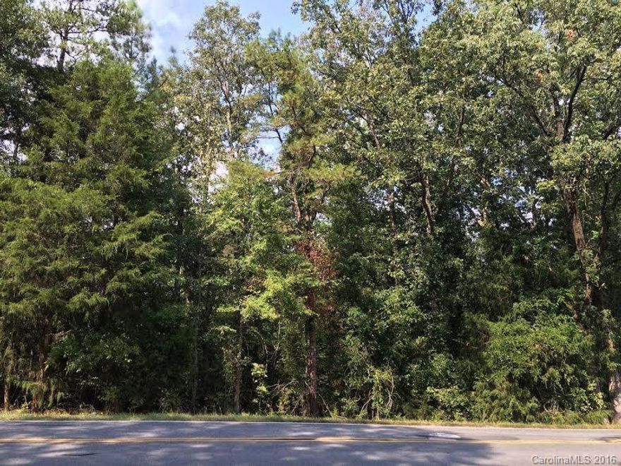 This is the perfect land to build your private country home.  5.18 acres of wooded land that is just off of the Catawba River.  This lot connects to a large pond that is the perfect backdrop for your quiet country getaway!