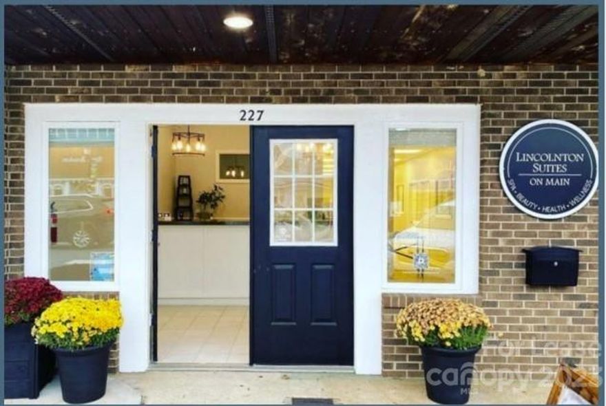 Rental space available for your health and wellness business at Lincolnton Suites on Main. Suite B is the last suite available inside this beautifully restored downtown building. Suite B has 2 windows and is at the front of the building.   It is equipped with sink with hot & cold-water connections and floor outlets. Wi-Fi, utilities and use of washer/dryer is included. Common area rooms included for your use are the beautiful lobby, kitchenette/laundry room and bathrooms. Ground level making it easily accessible with parking right in front. No stairs to climb.  Great location for massage therapist, physical therapist, counselor, dietician, or other type of health and wellness (excluding hair and nails). Run your own business in downtown Lincolnton with so much to offer. Building in 2nd block of main street with lots of foot traffic.