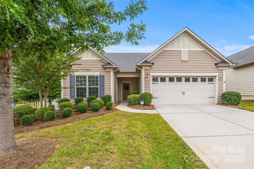 Huge price drop! Sellers have updated with fresh paint and new carpet!  This 2 bed, 2 bath charming home in the premier 55+ community of Carolina Orchards in Fort Mill is ready for its new owner!   984 Kirby sits on a corner lot right across the street from a dog park which gives a "green" view through the kitchen window. Through the front door, you will see an office, open kitchen, island seating, granite countertops and SS appliances. The living area has a gas fireplace and is spacious and open. At the back of the home, there is a bright sunroom and an outdoor patio! The primary bedroom, bathroom and large closet offer space for comfortable living, and then, as a bonus, the upstairs has a flex room and a large walk-in attic space. The 2-car garage is over-sized with extra room and the storage racks are included. On top of that, lawn care is included in your HOA fees so that you can rest, relax and enjoy all the amenities in this great neighborhood. All appliances are included.