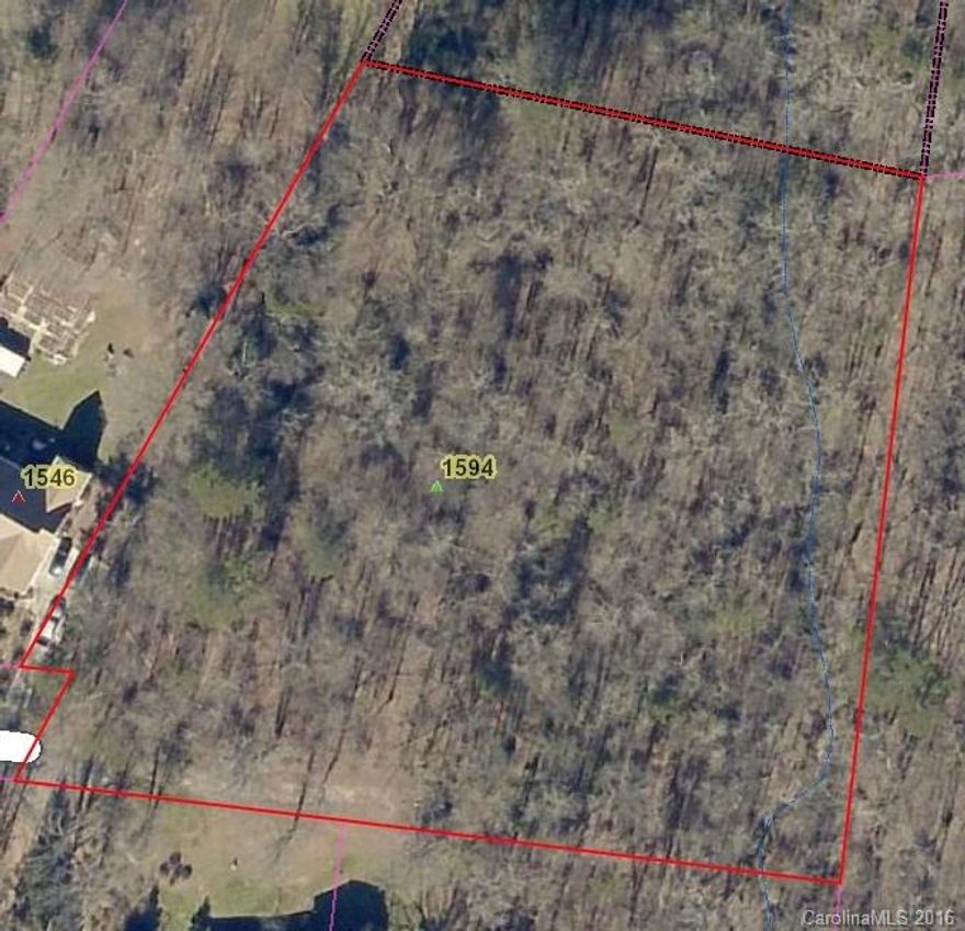 Nice Wooded Lot approximately 2.017 Acres just minutes from Hwy 55 & Hwy 557 Intersection. No Water or Septic Systems present on site-Installation of these systems will be at the expense of the buyer.