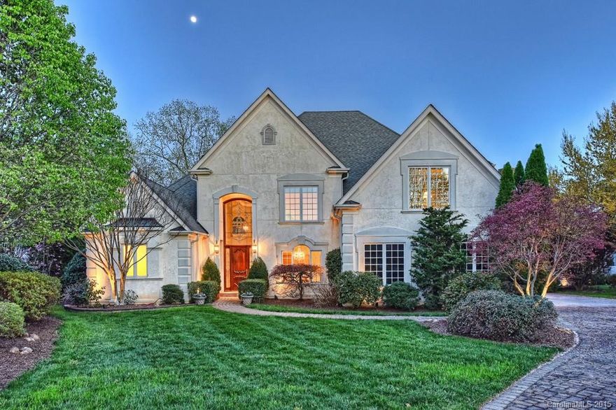 SELLER READY TO MOVE TO FLA!Custom built Peninsula WF estate w/spectacular water views.One of Peninsula’s premier streets&choice lake front lots.Elegant home w/soaring two-story great room,floor to ceiling windows,spacious open layout.Gourmet kitchen w/Woodmode cabinetry,Thermodor ovens,granite counters &lg center island.High end finishes incl limestone & HW floors,wide arched doorways,custom trim & moldings,stone FPs.Lakeside patio,scr porch,pier/boat dock.Full Peninsula Club Membership Avail