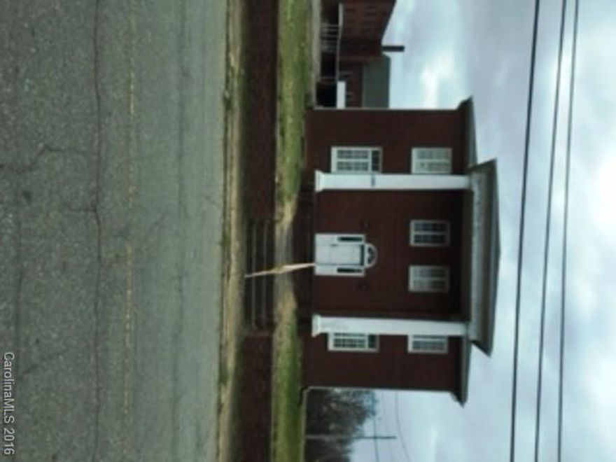 Two-Story Brick Office Building with lots of options for any type of business.