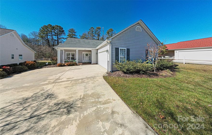 Lovely Deerlake Village cottage in the Meadows.  This 3/2 home is on one of the largest lots in the Meadows and backs up to a beautiful stream.  It boasts one level living with a two car garage and  both a rocking chair front porch and a rear screened porch. Close to walking trails and neighborhood amenities including clubhouse, swimming pool, lake and is also convenient to the Brevard hike/bike path. New roof in 2019 and new appliances in 2023.