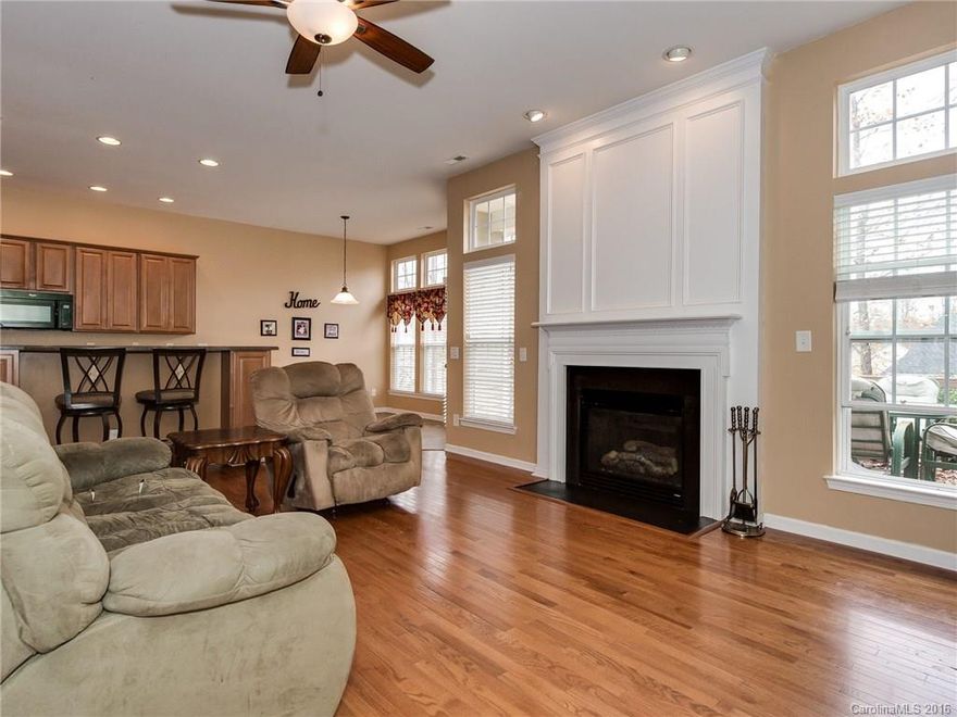 A highly desirable ranch home situated in the heart of Fort Mill. Amazing open floor plan with hardwood flooring throughout the home, including all bedrooms. Newly painted bedroom and bathroom. Fireplace with gas logs in great room. New roof in 2015. Semi-private backyard with deck. Close to new by-pass for easy access to interstates. Office with glass French doors. Top rated schools, affordable South Carolina taxes and excellent location. Paint allowance of $1,000 with accepted offer.