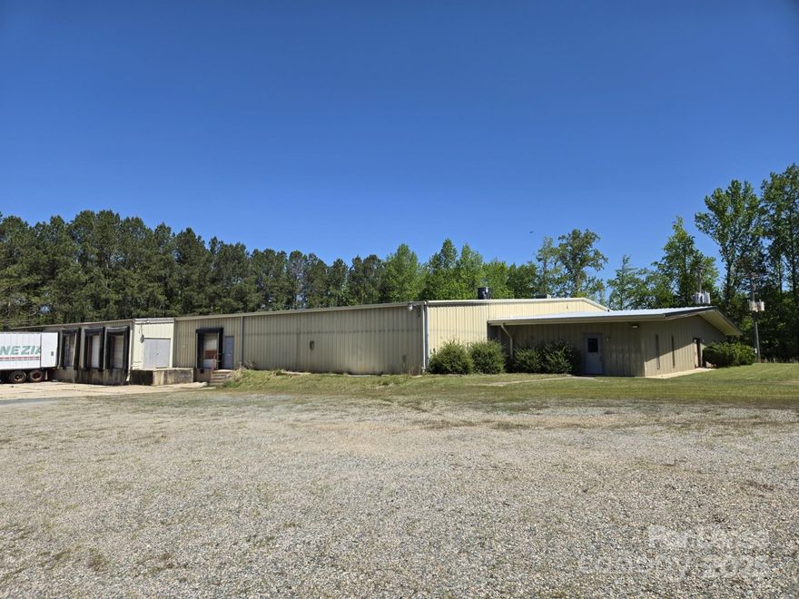 For Lease Or For Sale! Great space for any commercial/Warehouse business. 8+ acres to park multiple vehicles. Fenced area to secure property! Easy access to Hwy 74 and Hwy 52. 2500 Sq ft Office and 25K sq ft warehouse. Current tenant, so schedule appointment with Listing Broker. Ask about permitted uses. Call to discuss "For Sale" price! More pictures soon!