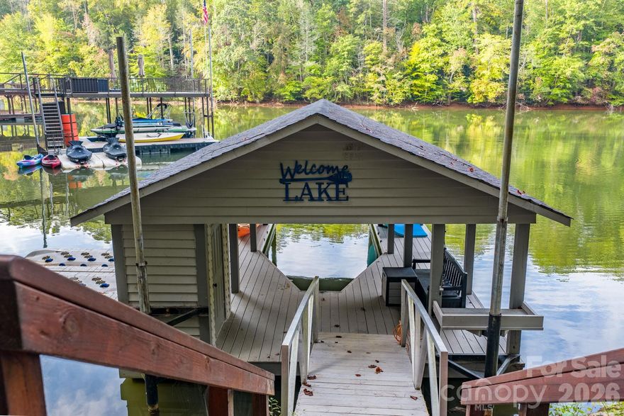 Nestled in The Arbor at Lake James, Lot 188 presents the perfect opportunity to build your dream waterfront home. This lot is fully prepped and ready for construction—a major plus with shoreline stabilization already completed, electricity available with power at the dock, a gravel road, and a parking pad in place.
Located in a peaceful no-wake zone with a scenic wooded view across the lake, the property provides a serene setting for your future home. A beautifully maintained covered dock conveys with the sale, featuring a storage closet with keyless entry and a ladder—everything you need to enjoy the water from day one. The lot has also previously perked for a 3-bedroom home.
The Arbor at Lake James offers gated security, well-maintained roads, a community pavilion, and a boat storage area. Conveniently located just minutes from downtown Marion and only a few miles from I-40, this property combines privacy, accessibility, and the beauty of lakefront living.
Don’t miss your chance to experience life on Lake James—schedule your showing today!