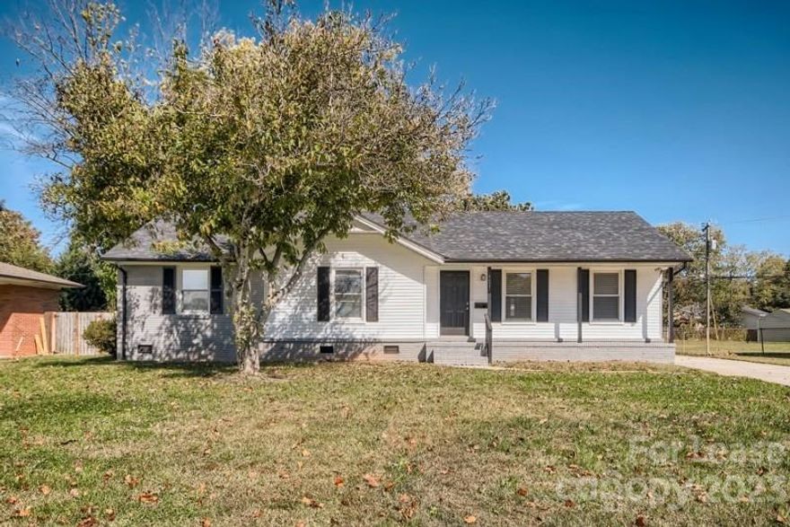 Updated ranch home convenient to uptown Charlotte.  The house has vinyl plank floors and fresh white walls.  The kitchen has been updated with new cabinets, stainless steel appliances, and granite countertops.   The kitchen is open to an enclosed patio and a family room.   The 2 bathrooms have been updated.  There is a large backyard with a detached 1-car garage.  Close to everything, restaurants, shopping, and to US 74.