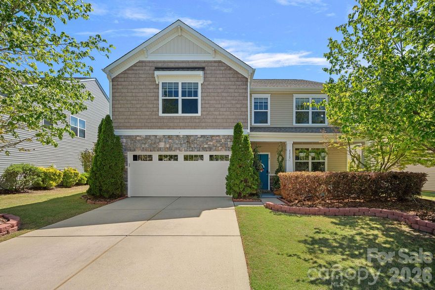 Experience elevated living in the heart of Ballantyne within the sought-after Stone Creek Ranch community, where this northeast-facing 6-bedroom, 3-bathroom home is perfectly positioned on a private lot overlooking a tranquil pond with serene water views.

Designed for both comfort and functionality, the first floor features an open layout filled with natural light, expansive backyard and pond views, fresh interior paint, a gas fireplace in the living room, formal sitting room, spacious kitchen with abundant storage and counter space, pantry, mud room, guest bedroom, and full bathroom.

Upstairs, the spacious primary suite offers a private balcony overlooking the water, creating a peaceful retreat with exceptional views. A spiral staircase leads directly to the extended patio below, providing a seamless indoor-outdoor living experience. The primary bath features dual vanities, soaking tub, separate shower, and walk-in closet. 

The second floor also includes a marble-floor flex space currently used as a relaxation/meditation room, along with four additional bedrooms. One oversized bedroom offers flexibility as a bonus or recreation room. Thoughtfully designed with exceptional storage throughout, the home offers multiple walk-in closets and storage solutions on each floor.

Notable upgrades include a roof replaced in 2023, two high-efficiency HVAC systems installed in 2023, a garage equipped for 2 car simultaneous charging (One Level 2 charger and One Level 2 outlet) with dedicated wiring in place for a second charger, app-controlled 9-zone irrigation system, smart garage door opener with integrated camera and app controls, Vivint home security system, and raised-bed enclosed vegetable garden.

Stone Creek Ranch residents enjoy access to multiple amenity centers, including north and south clubhouses, pools, playgrounds, and walking trails. Just minutes from I-485 and premier destinations including Stonecrest, Rea Farms, Waverly, The Fountains, Promenade on Providence, and Blakeney Town Center, residents enjoy top-tier shopping, dining and entertainment, as well as convenient access to Life Time Fitness Center and the walking trails at Flat Branch Nature Preserve. Located near exceptional top-rated schools, with the New Cato Ridge Middle School opening soon.