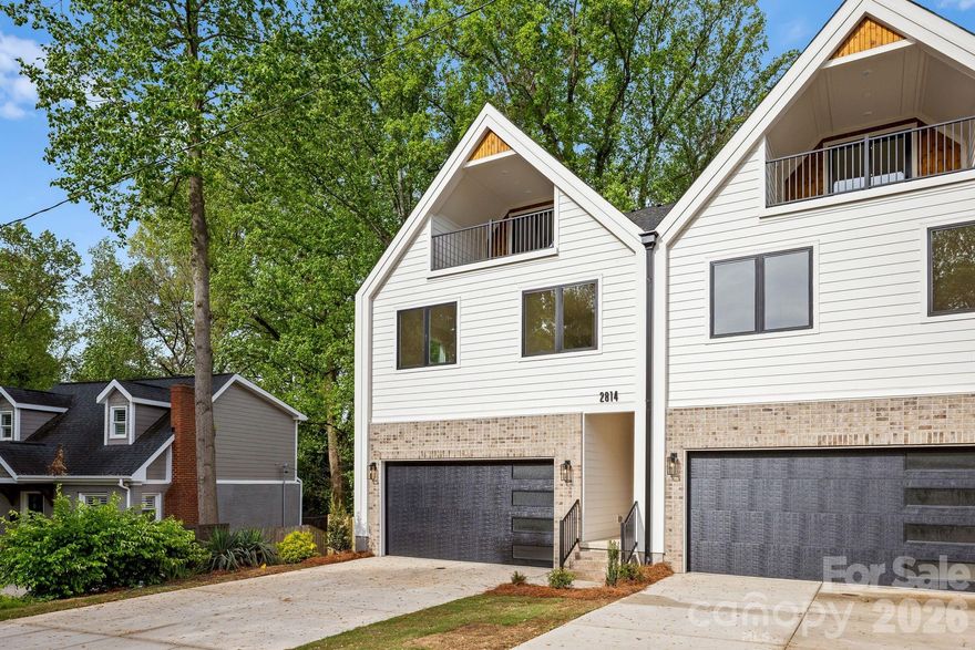 Discover modern luxury living in the heart of Charlotte's most dynamic up-and-coming neighborhood - Revolution Park! This stunning townhome offers sophisticated living with a spacious two-car garage, premium finishes, and an open, light-filled design. Gas range, tile backsplash and stainless steel appliances included. Engineered hardwoods throughout, custom lighting fixtures and accent/trim walls bring this well-designed home to life. Designer tile in the bathrooms plus a walk out balcony on the third floor with seasonal views of Uptown Charlotte. Nestled in a rapidly growing neighborhood just minutes from South End, Wilmore, and Uptown Charlotte, this home puts you at the center of it all. Enjoy effortless access to top restaurants, breweries, cultural hotspots, major employers, and endless entertainment—without the long commute. No HOA means freedom to live life on your terms—no restrictions, no fees, just pure ownership enjoyment. Schedule your tour today!