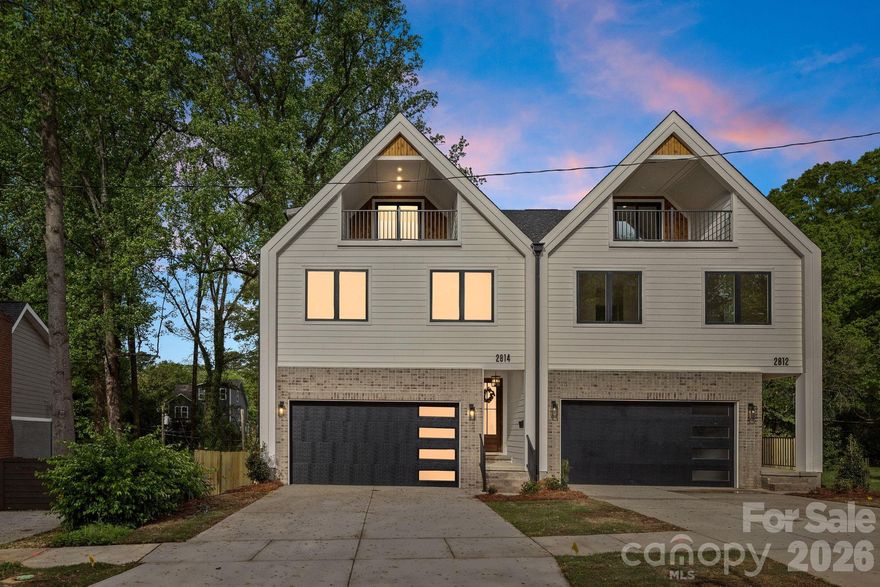 Discover modern luxury living in the heart of Charlotte's most dynamic up-and-coming neighborhood - Revolution Park! This stunning townhome offers sophisticated living with a spacious two-car garage, premium finishes, and an open, light-filled design. Gas range, tile backsplash and stainless steel appliances included. Engineered hardwoods throughout, custom lighting fixtures and accent/trim walls bring this well-designed home to life. Designer tile in the bathrooms plus a walk out balcony on the third floor with seasonal views of Uptown Charlotte. Nestled in a rapidly growing neighborhood just minutes from South End, Wilmore, and Uptown Charlotte, this home puts you at the center of it all. Enjoy effortless access to top restaurants, breweries, cultural hotspots, major employers, and endless entertainment—without the long commute. No HOA means freedom to live life on your terms—no restrictions, no fees, just pure ownership enjoyment. Schedule your tour today!