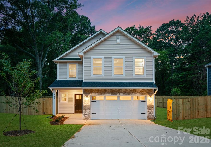 Discover modern living in this thoughtfully designed new construction home nestled in an established Charlotte neighborhood with quick access to both I-85 and I-77, making commuting throughout the city simple and convenient. This spacious two-story floor plan offers 4 bedrooms, 2.5 bathrooms, a versatile upstairs loft, and a fenced backyard—perfect for entertaining, relaxing, or everyday enjoyment. The open-concept main level features luxury vinyl plank flooring, contemporary finishes, and a beautifully appointed kitchen with stainless steel appliances, soft-close cabinetry, and ample workspace for cooking and gathering. Upstairs, the primary suite provides a comfortable retreat with a walk-in closet and private bath, while nearby shopping, dining, and Uptown attractions add to the appeal of this prime location. Photos are representative of a similar home and may not reflect final finishes.