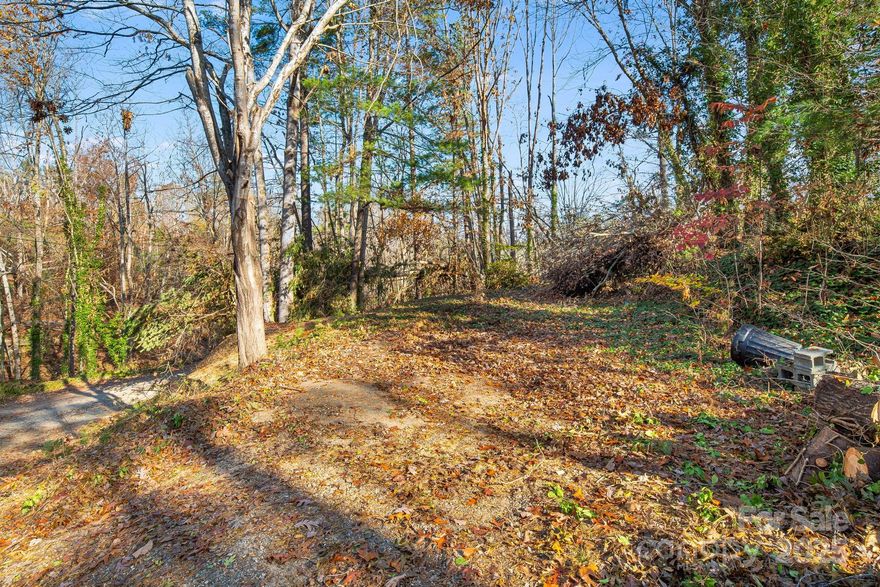 Unlock the potential of this exceptional property, perfectly situated for your dream home. This great property has already perked for a 2-bedroom septic, providing a solid foundation for your plans. Location is key, and this property is just 2 miles from Weaverville where you can enjoy local shops, dining, and community events. Plus, you're only 9 miles from the vibrant city of Asheville with all it has to offer. The lot has a flat building pad, making it an easy site to develop. Enjoy the convenience of nearby amenities while embracing the tranquility of the surrounding nature. Don't miss your chance to create your ideal retreat in this prime location!