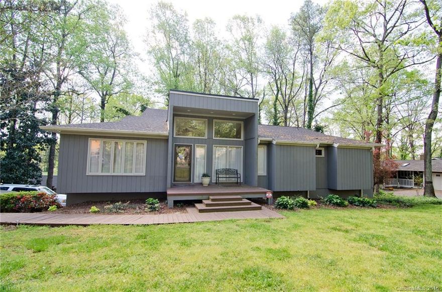 WOW REMODEL/RENOVATION JOB!!  EVERYTHING IN THE HOUSE HAS BEEN REDONE. HUGE MEDIA ROOM W FULL SCREEN, BAR FOR ENTERTAINING, LOTS OF OUTDOOR LIVING SPACE W BIG DECK &PAVER PATIO, HARDWOODS, LARGE TILE WALK IN SHOWER IN MASTER, STAINLESS APPLIANCES, FORMAL DINING,GREAT ROOM W SOARING CEILINGS, EAT IN BAR W OPEN KITCHEN,HUGE BONUS ROOM/PLAYROOM DOWNSTAIRS, BEAUTIFUL VIEW OF GOLF COURSE,CLOSE TO THE PARK,WALKING TRAILS,GATED COMMUNITY,CLOVER SCHOOLS! ENJOY LAKE LIVING W/MARINA & PARK ALL WALKABLE