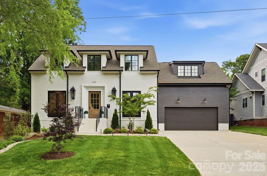 Sophistication and comfort converge in this custom Pike Properties, high-end residence showcasing five generous bedrooms, four full bathrooms plus 1 half bathroom, all finished with meticulous designer detail from the front door to the private backyard retreat while situated on a quiet, dead-end street. White oak hardwoods span the home, while designer finishes create a warm, elevated ambiance in every room.
A bright, open main level features the inviting great room with a gas log fireplace, custom built-ins, and expansive views to the outdoor living areas. The space flows effortlessly into the chef’s kitchen, where custom shaker style cabinetry provides abundant storage, including an additional pantry, and professional-grade stainless steel appliances are framed by quartz countertops, stunning tile backsplash, and glistening gold accents. An adjacent dining room with a statement chandelier and large picture windows peering out to the yard makes both everyday meals and entertaining feel special. A complete guest suite with full bathroom is thoughtfully tucked away on the main floor for privacy and main level office space for versatility.
Upstairs, the primary bedroom retreat is a serene sanctuary with a vaulted wood beam accent ceiling, generous proportions, and tranquil views. The spa-inspired bathroom showcases a double vanity, freestanding tub, and designer-tiled shower, creating a true boutique-hotel experience at home. All secondary bedrooms feature hardwood flooring, while the secondary bathrooms are finished with ornate tile selections and furniture-style vanities for a cohesive, upscale feel throughout.
Designed for effortless indoor-outdoor living, the great room opens to an expansive covered terrace with slate tile flooring and an outdoor gas log fireplace, extending the main living area into a sophisticated alfresco lounge. Here you will also find a built-in grill and a fully realized outdoor kitchen, ideal for hosting gatherings year-round. Motorized retractable screens transform the terrace into an all-season room at the touch of a button. Just beyond, a resort-style pool with integrated spa and sun ledge is framed by crisp hardscape and manicured landscaping, creating a private, magazine-worthy backdrop.
The fenced backyard provides ample green space for play and pets, while the front elevation presents timeless curb appeal with painted brick, contrasting siding, and thoughtfully designed landscaping.
Every element of this residence has been curated for homeowners who appreciate clean lines, warm modern design, and resort-level amenities—all in a truly turnkey, luxurious package.