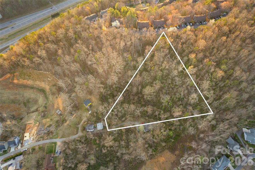 Discover the perfect place to build in the mountains just minutes from the heart of Asheville. This beautiful 2.2-acre parcel on Weaver Hill Rd offers breathtaking mountain views and a rare opportunity to create something special in one of Western North Carolina’s most vibrant communities. With low-density multi-family zoning, the possibilities are wide open—whether you're dreaming of a private mountain retreat or a thoughtfully designed investment property. Enjoy the best of both worlds: peaceful surroundings and quick access to everything that makes Asheville so loved. Spend your days exploring the city’s renowned food scene, unique local shops, art galleries, breweries, and live music, then come home to fresh mountain air and scenic views. With shopping, dining, and major roadways just minutes away, this location offers the perfect blend of convenience, adventure, and mountain lifestyle.