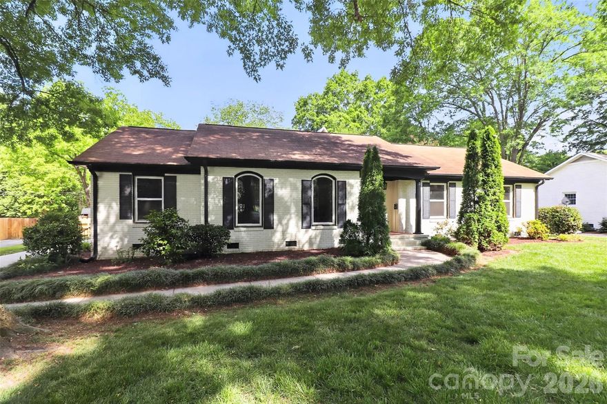 Charming and beautifully updated, this classic brick ranch on THE most beautiful street in OP offers the perfect blend of timeless character and modern comfort. Situated on a spacious lot, this 3-bedroom, 2-bath home welcomes you with a freshly painted brick exterior and a warm, inviting presence.

Inside, you’ll find gleaming hardwood floors throughout and a freshly painted interior that feels bright and move-in ready. The fully renovated kitchen features stylish finishes, updated cabinetry, and modern appliances—perfect for everyday living and entertaining alike. Both bathrooms have been thoughtfully updated with contemporary touches and quality craftsmanship.

The cozy living area is anchored by a fireplace with gas logs, creating the ideal space to relax and unwind. Step outside to your own private retreat, where a custom pond serves as the centerpiece of a beautifully landscaped backyard. A patio and winding pathway are surrounded by lush vegetation and blooming flowers that provide color and tranquility in every season.

Additional features include a detached carport and a separate detached garage, offering ample parking and storage options.

This thoughtfully updated home combines comfort, charm, and outdoor beauty—ready for you to enjoy from day one.
