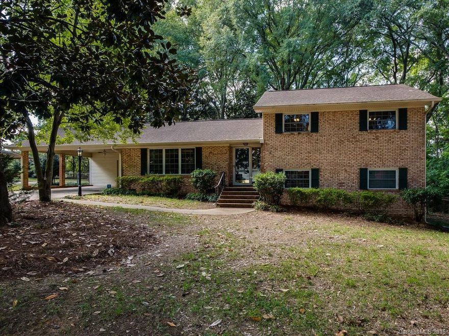 Popular Beverly Woods neighborhood, updated 4BR 3BA split-level home w/ car carport. Cook's kitchen features gas stove, solid surface counter tops, tile back splash, & new wood floors. DR features chair & crown molding w/ french doors leading to large screened porch. Refinished wood floors & new carpet. 2 huge living areas. Large master bedroom w/ 2 closets. Updated master bath w/ new vanity & tile. Large private yard with storage shed. Minutes from South Park, restaurants, shopping & more.