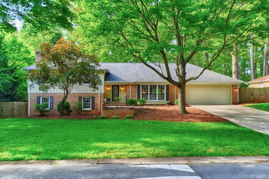 Welcoming 4 bedroom home full of character in Stonehaven w rare attached 2 car garage! Updated kitchen w granite, tile flooring and stainless appliances - fridge conveys. Eat-n breakfast area. Formal Living & Dining Rooms offer crown molding. Master bedroom w private updated bath! Lower level Rec Room features built-ins, brick surround fireplace & wetbar. Screened porch & deck overlook fully fenced beautiful yard w mature trees & lush grass. New roof in 2014.