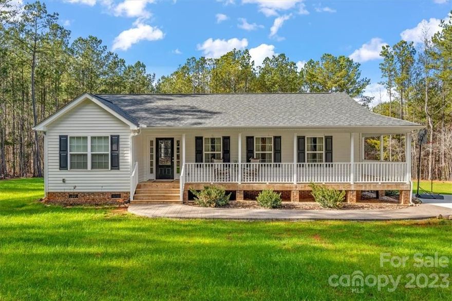 Country living at its best! Are you looking for an escape from all the hustle and bustle but don't want to be to far from the nearest grocery store? Well come enjoy a glass of iced tea on your new wrap around front porch! This basically new construction home will wow you from the moment you set foot inside. From the oversized island, open floor plan, to the built in fire pit you won't be disappointed hosting the next family bbq! And did we mention it has almost 5 acres? Enjoy some peace and quiet in your backyard retreat. This one really does have it all folks! Run before it is too late! Ask your realtor to talk to the listing agent in regards to closing cost incentives offered by the sellers preferred lender.