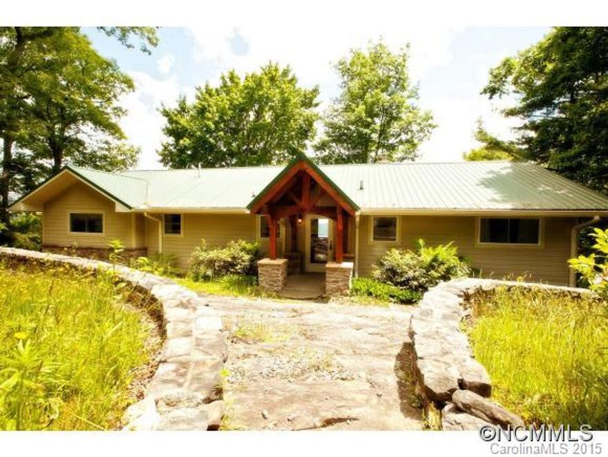 Remarkable panoramic views from Laurel Knob across Sapphire Valley to Rock Mountain. Very cozy 60's home re-modeled in mid 80's. Home on 0.85 acres. Incredible view for the price! Great Florida room overlooking the phenomenal view. Minutes from the Crossroads. Ideal project for remodeling, or enjoy it the way it is!