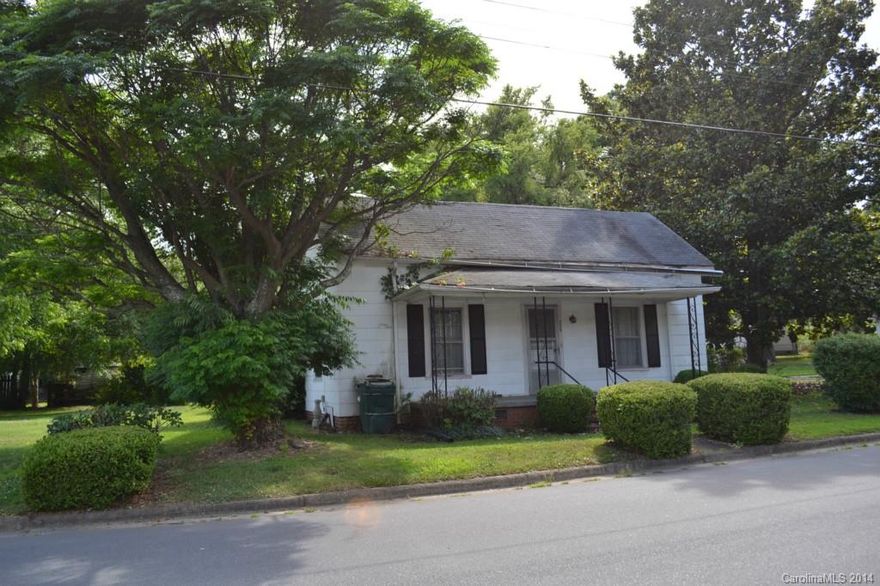 SELLERS WILL ENTERTAIN OFFERS BETWEEN $9,900.00 - $19,876.00  Seller gives no value to home structure currently on the property.  Home-(structure) to be sold as is where is.  Purchase price will be for land value only.  Great opportunity near downtown Mooresville.