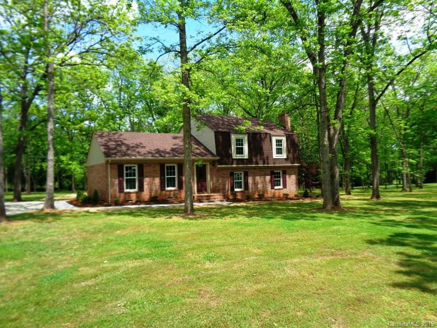 100% USDA FINANCING ELIGIBLE! New roof & windows,New HVAC,New cabinets in kitchen & baths, new granite countertop & travertine backsplash in kitchen, New water heater, New carpet & paint,New exterior & interior doors, crown molding throughout, New laminate flooring in kitchen, dining rm, living rm & foyer. New vinyl siding on garage & portions of home. Stone fireplace in large family rm w/ mounted 48" flat screen TV. Smooth ceiling. Huge yard with mature pecan trees & hardwoods.New covered deck.