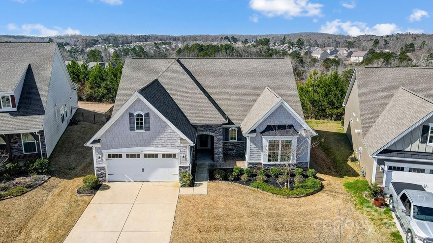 Get ready to be captivated by this magnificent home! This designer beauty exudes style and elegance with features like crown molding, modern fans, custom paint, and upgraded lighting, making it the perfect place to call home. The gourmet kitchen is a standout with double ovens, a subway tile backsplash, "linen" maple cabinets, and large island. The home exterior's showcases a screened porch, an outdoor paver patio with a grilling island, and stunning sunset views. The tree-lined, fenced-in backyard backs up to trees, offering privacy. This energy-efficient home not only looks great but also has a HERS rating of 60, ensuring your energy bills will be impressively low. Situated in the renowned Clover Schools district, just a short drive from Charlotte, and moments away from Lake Wylie for water activities, this residence offers the best of both worlds with low SC taxes. Don't let this opportunity pass you by – book a tour today to experience this exceptional 3-bedroom, 2.5-bathroom home!
