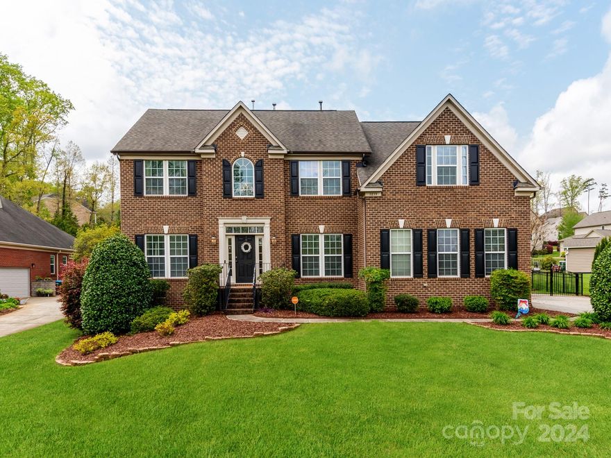 Beautiful home in highly sought after Abbington neighborhood is a must see!! You are greeted by a 2 story entry way, walk into spacious kitchen w/ white cabinets, grnt countertops, tile backsplash, SS appliances. You will love  double ovens & gas stove, choose to eat at large kitchen island or roomy breakfast area. Entertain in the family room w/ open concept from kitchen, as well as living room that opens into dining area. Home boasts 5 bedrooms, w/ an additional large bonus rm, & one bedroom is a second primary suite on main floor. The generous primary suite has a tray ceiling, primary bathroom has dual vanities, & large walk-in closet. Secondary bedrooms are separated by hallway. Fully remodeled in 2023: hall bath boasts dual sinks, tile floor & shower. Your favorite place may be the screened in porch overlooking the backyard, composite deck, fan, & tv outlet. Backyard has an outside kitchen area w/ built-in flat top griddle, fridge,& fire pit area. So much to love about this home!