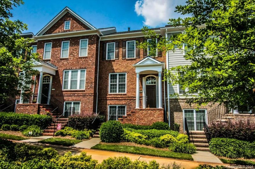 Great townhouse with exceptional wooded views in front and in back.  Gorgeous kitchen with stainless steel appliances, granite counter tops and 42" cherry cabinets.  Hardwood floors on the main level accentuate the open floor plan complete with gas log fireplace in LR.  Trey ceilings, walk-in closets, and private bathrooms can be found in the two bedrooms on the upper level.  The lower level bedroom has its own private bath.  Easy living with amenities galore in Baxter Village!