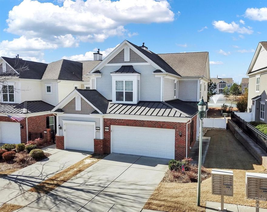 Welcome to this perfectly located Carriage Home in Sun City Carolina Lakes! As you bound the top of the stairs, you will be amazed at the open concept floor-plan, abundance of windows for natural light and stunning large crown molding! Great split bedroom plan with guest bedroom at front, large bathroom with dual vanities, and an office with french doors! The primary bedroom is situated at the back of the home overlooking one of the many neighborhood lakes, which is a perfect retreat and pairs nicely with the large bathroom with dual sink vanity, garden soaking tub, shower, and large custom closet! Additional features include a gas fireplace, large kitchen, SS appliances, formal dining, breakfast nook, laundry room and 2 car garage! Screened in patio with stunning view of the lake, perfect for your morning coffee or evening cocktail! Carriage homes are conveniently located at the front of the neighborhood and close to many of the amazing SCCL amenities, shopping, dining and much more!