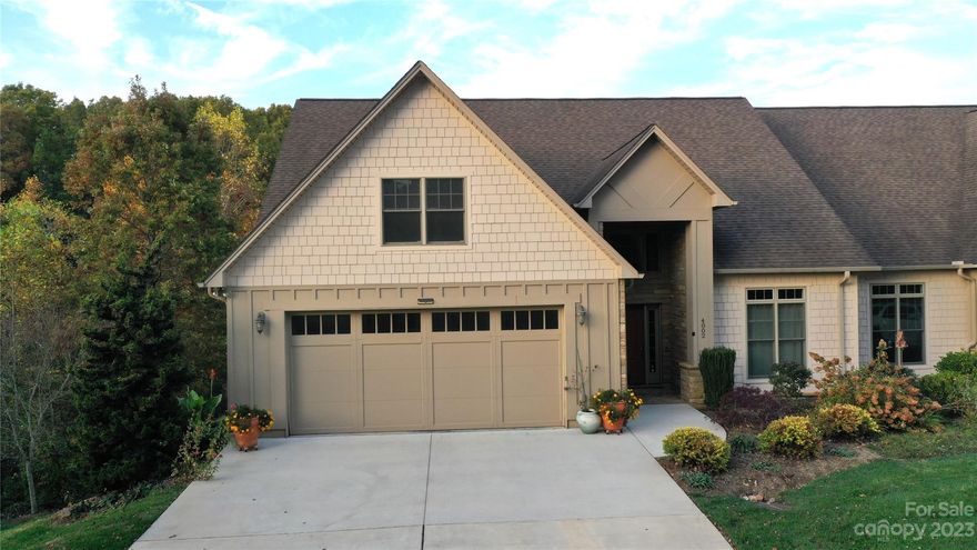 Beautiful townhome in the Laurels of Rock Barn! This unit features two bedrooms on the main level, a large great room with a stone framed gas-log fireplace which is open to the kitchen and the dining area. Step out onto the open deck or screened porch on the main level to views of trees and the sound of Lyle Creek below. On the lower level you will find two additional ensuite bedrooms, a large family room and two large storage/hobby rooms. The lower level also has a large deck with private views to the trees and the creek below. Just a tour through this home and you will fall in love!!! Come join the Rock Barn community; two top rated championship golf courses, two club house facilities, three restaurants, a five-star spa with a salt cave and mineral pool, a tennis and pickleball complex, a fitness center, a large outdoor pool and great people! Easy access to I-40. New roof just installed, Nov. 2023!