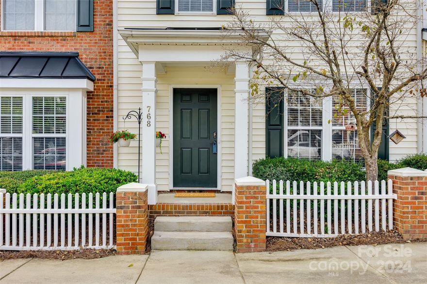 Welcome to this charming 2 bedrm 2.5 bath townhome located in the desirable Manchester Village.  The standout feature of this home is its spacious, open-concept eat-in kitchen, providing style and function.  The kitchen boasts modern grey shaker-style cabinet fronts, a large island providing ample workspace, and an eye-catching  backsplash that adds a touch of sophistication. The kitchen leads directly to an outdoor space perfect for morning coffee or evening relaxation. Adjacent to the kitchen is a flex room, ideal for use as an office, sitting room, or formal dining area with French doors to the living room.  Added recessed lights enhance the 9 ft ceilings on the first floor. Upstairs the primary bedrm has an updated en-suite bathroom and walk-in closet, a 2nd bedrm and full bath. Manchester Village offers tree-lined streets, picket fences, sidewalks, streetlights and community pool. Conveniently located behind Target, minutes to I-77. Easy commute to Charlotte.