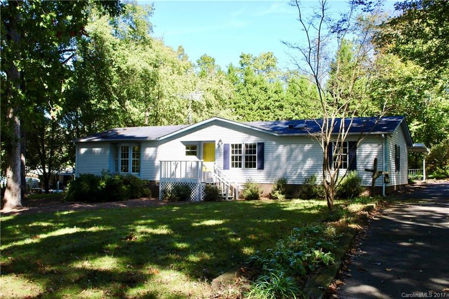 Nice home on the east side, 3 Bedrooms and 2 baths, spacious living room with stone fireplace, sunroom, kitchen with breakfast bar, master bedroom with walkin closets and private bath with garden tub, deck, carport, 2 storage buildings wired and workshop wired. $89,900