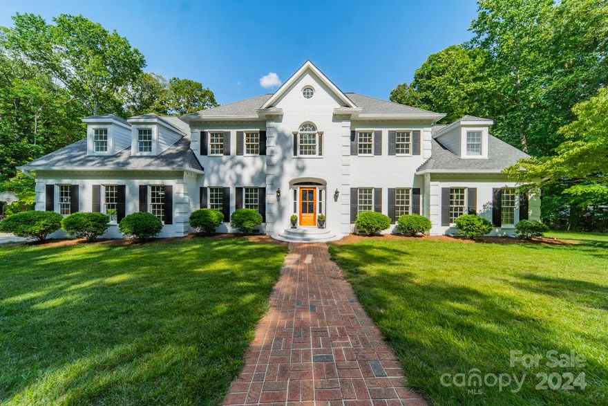 Experience luxury in this stunning, fully renovated full brick home on 5 acres, ideal for horse enthusiasts. This exceptional property features a custom kitchen with marble countertops, double wall ovens, and a stainless apron sink. Enjoy outdoor relaxation on the rear patio and the convenience of a circular driveway. Inside, the main level showcases hardwood floors, an office, drop zone and sunroom. The master on main en-suite includes a bedroom sized walk-in closet, double vanities, and a marble shower with dual shower heads. Upstairs you will find 3 large bedrooms, 2 of which are en-suites, providing ample space and privacy, a walk-in attic, bonus and exercise room.  With laundry rooms on both floors, everyday living is made effortless. This home offers an optional HOA. Don't miss the chance to own this extraordinary property in a peaceful setting. Only 1.2 miles from Marvin Swim Club. Check out the virtual tour. 5 BR but perced for 4. 5th BR used as exercise room. NC agent owned.