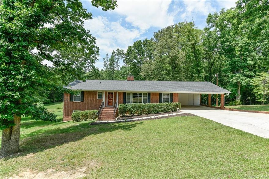 Wow!  This two bedroom home has over 1600 sq ft.  New kitchen with granite and stainless.  Den, dining and living room.  You will love how well taken care of this home is.  Spotless in an understatement.  Large deck overlooking private back yard.