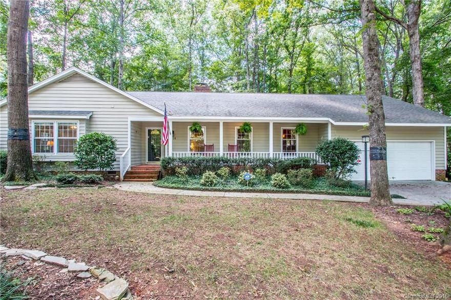 Sprawling ranch in South Charlotte, Deerpark subdivision of Raintree boasts a sunroom overlooking park-like yard with brick patios and walkways, deck, sprinkler system. Exterior cedar siding. The inviting great room wood-burning fireplace is a great place for cozy relaxation. Formal living and dining rooms and eat-in kitchen. New double French doors. Freshly stained deck. Near excellent public and private schools. Initiation fee to Raintree Country Club waived. Separate membership fees apply.